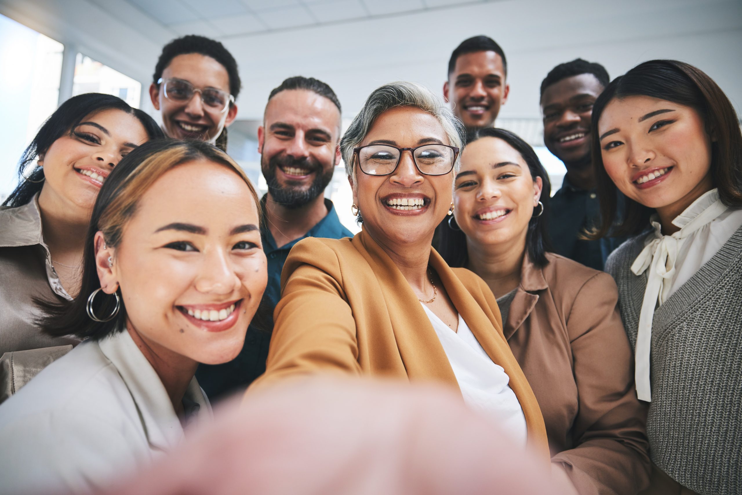 Group of happy leaders taking selfie in Transformational Management Training San Francisco, Leadership Training San Francisco.